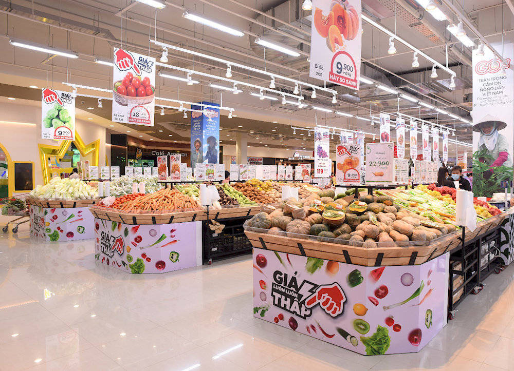 The GO! Supermarket is brightly lit and packed with fresh produce, promotions, and imported fruits for the whole family