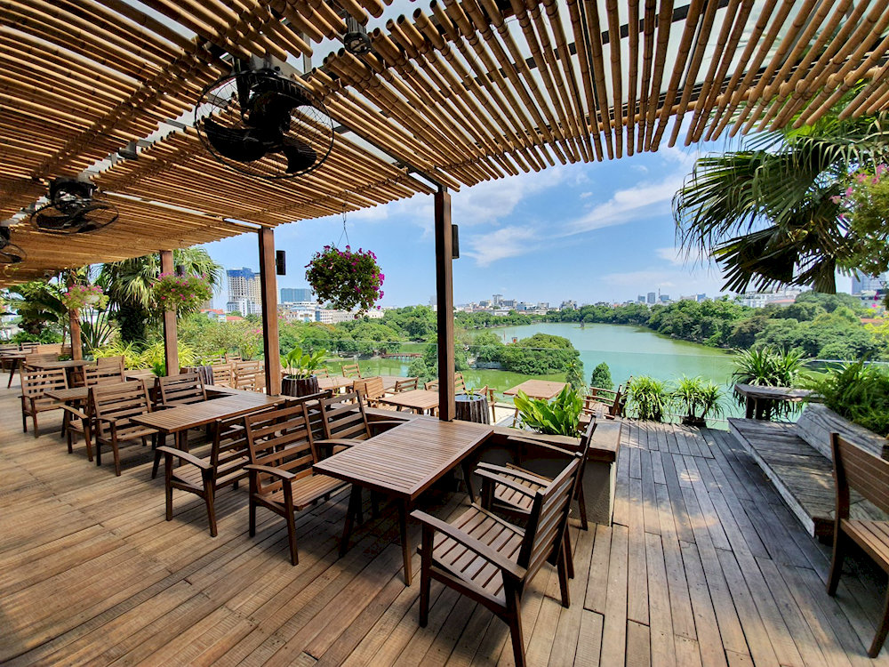 Cau Go's stunning rooftop terrace offers unmatched views of Hoan Kiem Lake and Hanoi's Old Quarter